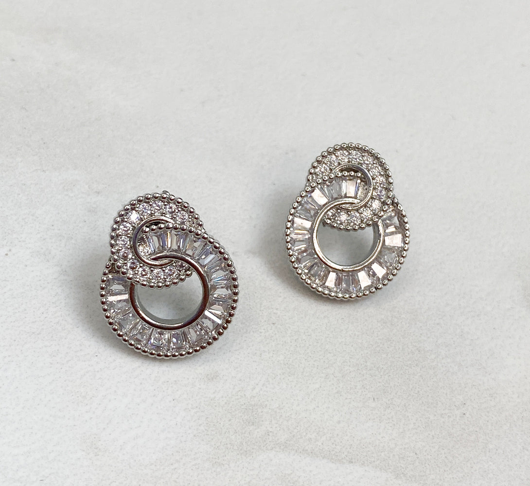 RIA Silver Interlocking Cubic Zirconia Crystal Earrings