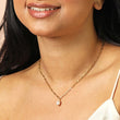 Woman wearing gold paperclip chain necklace with freshwater pearl pendant drop, selling womens jewellery gifts