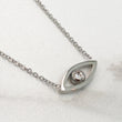 Womens silver evil eye necklace, made from stainless steel with zirconia crystal. Evil eye is a talisman protection symbol