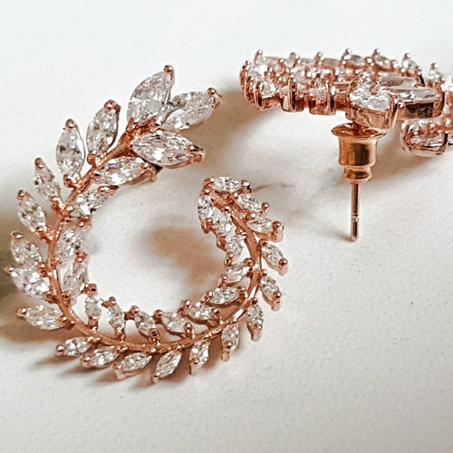 womens rose gold swirl rhinestone earrings