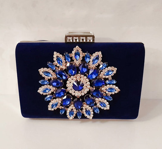 Buy TREASO CLOSET Emboss Blue Clutch Bag for Women online