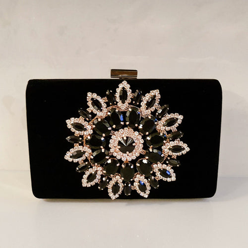 black embellished clutch bag