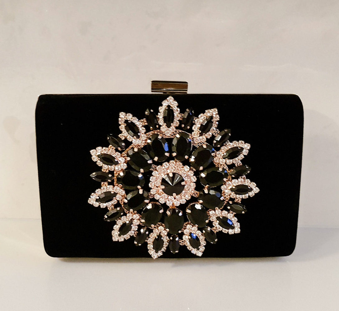 black embellished clutch bag