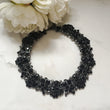 black statement necklace with rhinestones and jewels