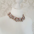pink statement necklace and earrings
