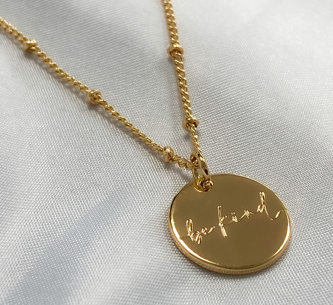 18k Gold disc pendant on satellite chain for her