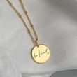 Gold satellite chain necklace with round pendant