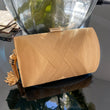 Gold tassel clutchbag