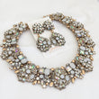 ladies gold jewellery set with big white jewel earrings